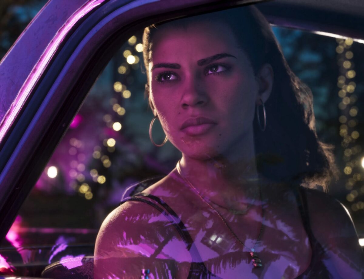 Lucia au volant d'une voiture de nuit sous les neons de Vice City, image officielle 4K