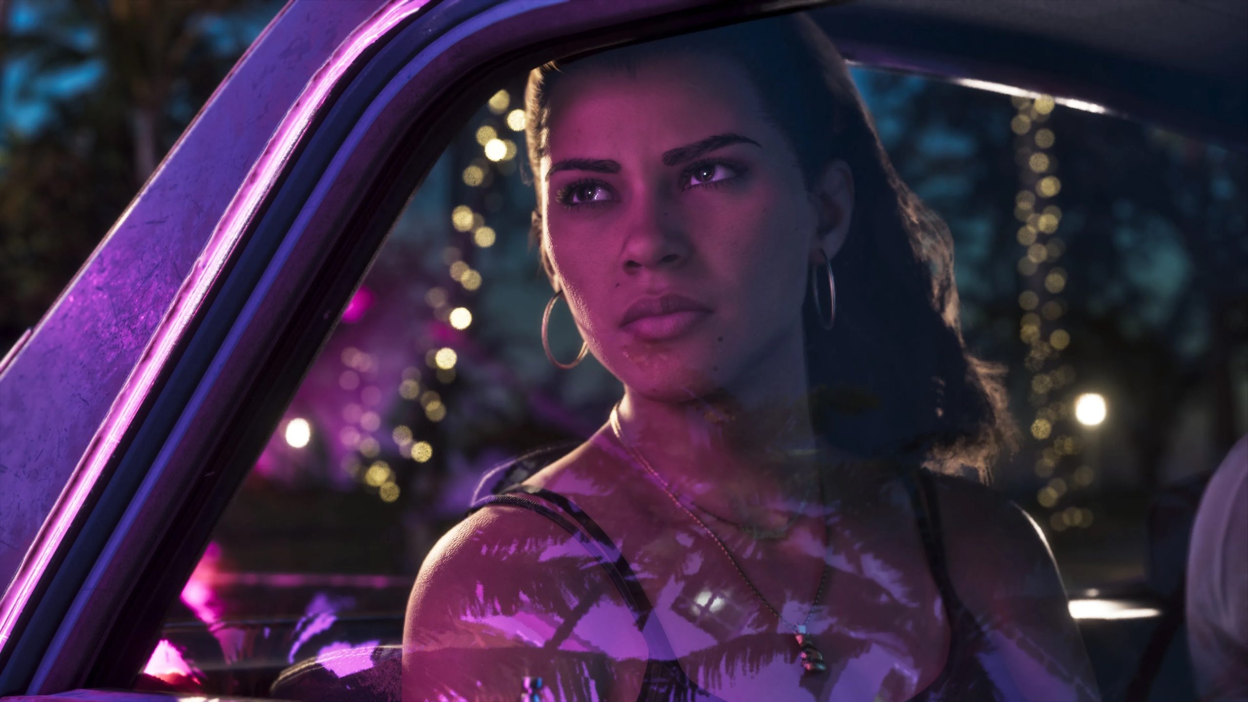 Lucia au volant d'une voiture de nuit sous les néons de Vice City
