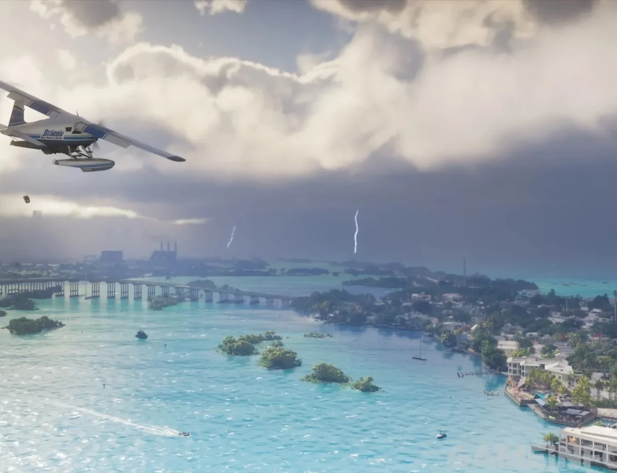 Capture de GTA VI publiée par Game Informer : un hydravion survole des îles et une eau turquoise sous un ciel orageux
