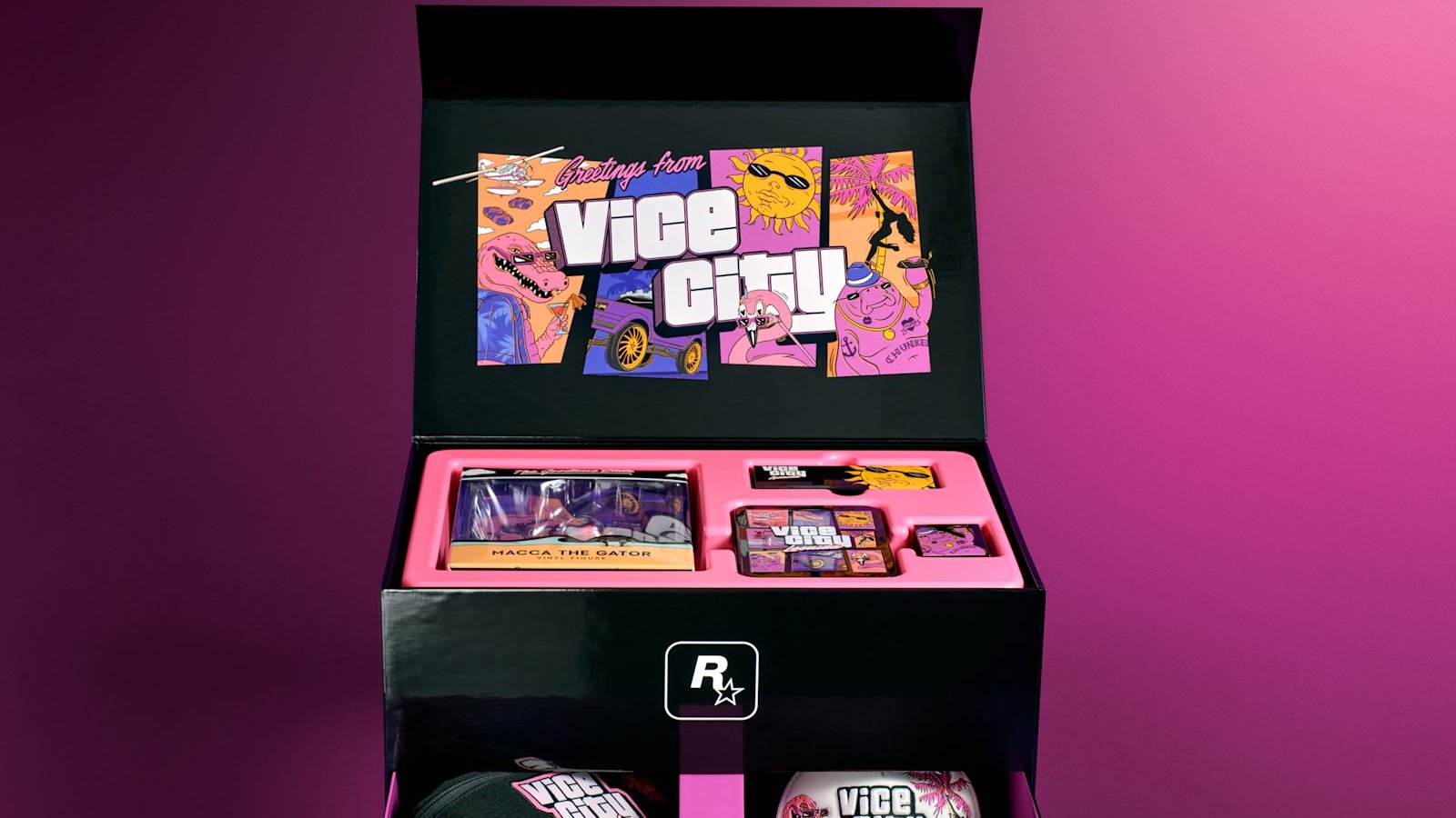 Coffret collector GTA VI The Goodtime State Vice City Collection ouvert, avec l'illustration Greetings from Vice City et la boîte de la figurine Macca the Gator