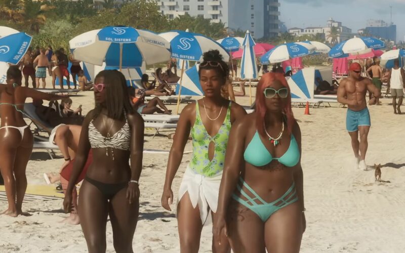 Trois personnages feminins marchant sur une plage bordee de parasols bleus et blancs de la marque Sol Sisters, GTA VI