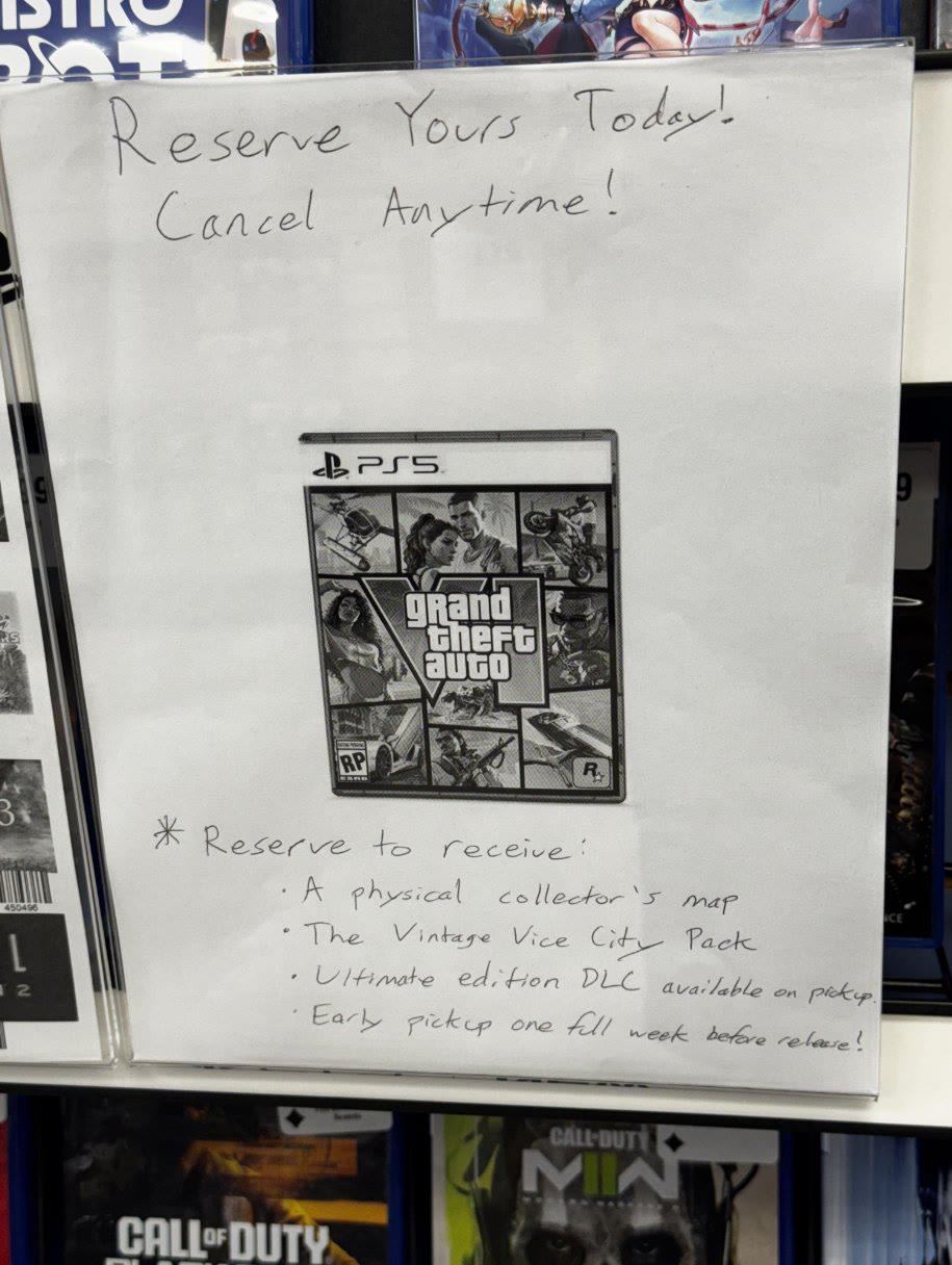 Affiche entière d’un GameStop : réservez GTA VI pour recevoir une carte collector, le pack Vintage Vice City, l’accès à l’édition Ultimate et un retrait une semaine avant la sortie
