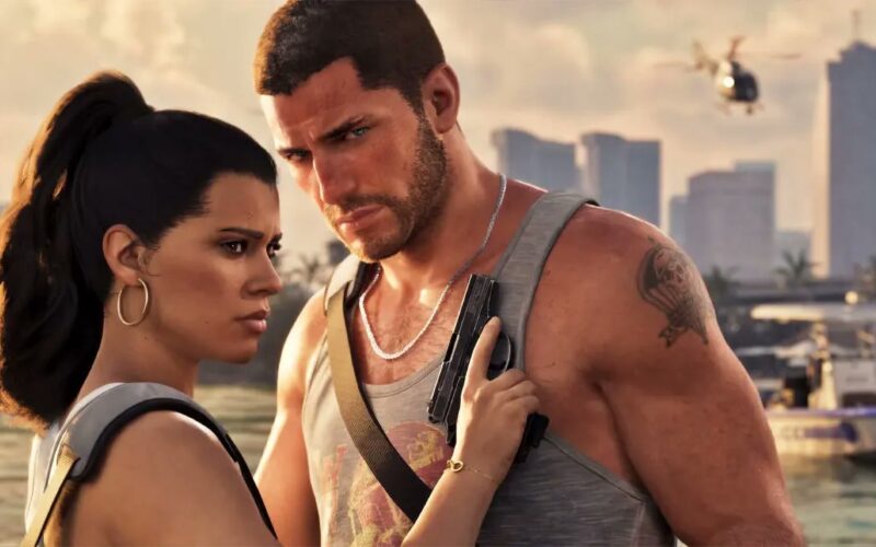 Jason Duval et Lucia Caminos côte à côte devant la baie de Vice City, Lucia tenant un pistolet contre le torse de Jason