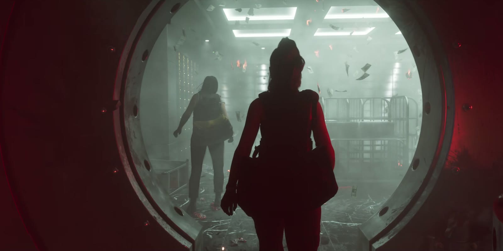 Une silhouette encapuchonnée devant une porte ronde de coffre-fort, Launch Trailer de GTA VI