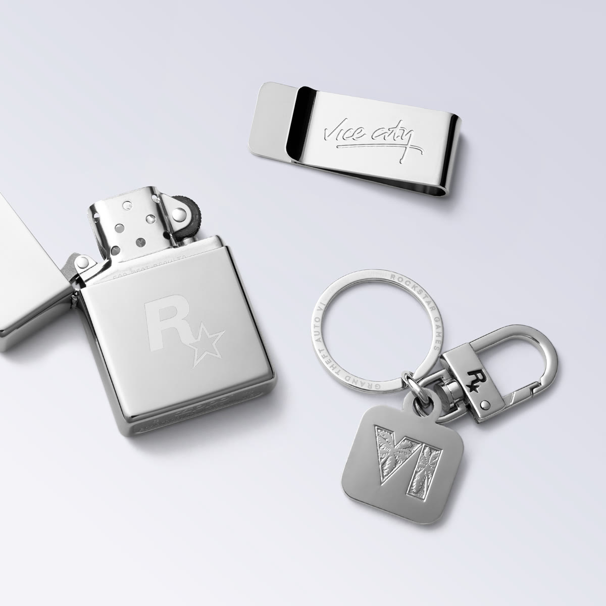 Briquet Zippo chromé au logo Rockstar, pince à billets Vice City et porte-clés au logo VI à palmiers